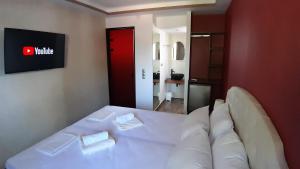 Postel nebo postele na pokoji v ubytování Villa Park Luxury Rooms