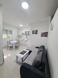 Posezení v ubytování Apartmani Popivoda