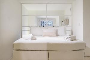 Cama ou camas em um quarto em Contempora Apartments - Breno 2