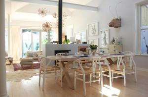 a dining room with a table and chairs at Himmelblau Boutique Bed and Breakfast in Cape Town