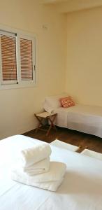 Postel nebo postele na pokoji v ubytování Les Llambrich - Apartamentos turísticos