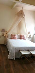 Postel nebo postele na pokoji v ubytování Les Llambrich - Apartamentos turísticos