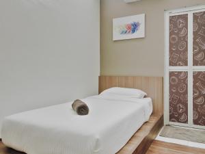 Postel nebo postele na pokoji v ubytování Hotel Eco Desaru
