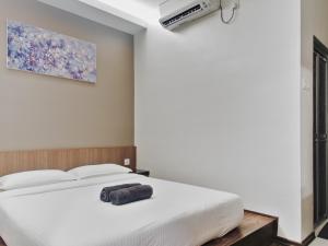 Postel nebo postele na pokoji v ubytování Hotel Eco Desaru