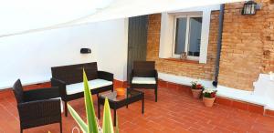 Posezení v ubytování Les Llambrich - Apartamentos turísticos
