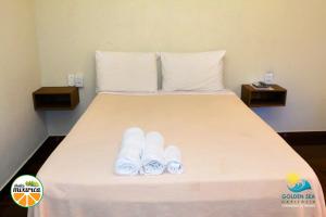 Ein Bett oder Betten in einem Zimmer der Unterkunft Chales Mixirica
