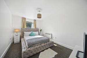 En eller flere senge i et værelse på MARLEX Modern 1 Bed Apartment London Bridge Tower Bridge