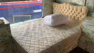 a bed in the back of a truck at Vintage, Circus Holiday Home in Mablethorpe