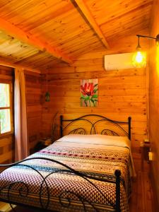 Postel nebo postele na pokoji v ubytování Happy Glamping Cy