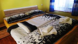 Postel nebo postele na pokoji v ubytování Apartmány v Centru