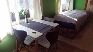 Postel nebo postele na pokoji v ubytování Apartmány v Centru