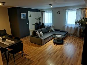 Posezení v ubytování Apartamenty pod Dzikowcem