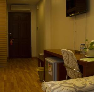 TV a/nebo společenská místnost v ubytování Anh Dao Mekong Hotel