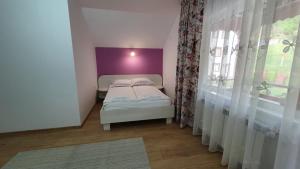 Postel nebo postele na pokoji v ubytování Casa Balint