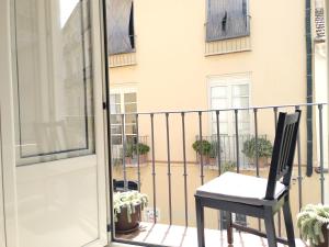 A balcony or terrace at La Siesta Malaga Guesthouse