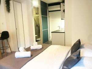 Posteľ alebo postele v izbe v ubytovaní Apartment Zagreb Jacuzzi
