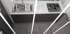 A cozinha ou kitchenette de Appartamenti porta mare