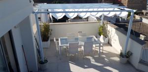 Uma varanda ou terraço em Appartamenti porta mare
