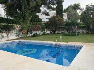 Bazén v ubytovaní Sol Ohana Apartamento Boutique alebo v jeho blízkosti