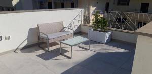 Uma varanda ou terraço em Appartamenti porta mare