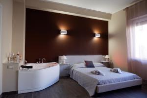 Postel nebo postele na pokoji v ubytování B&B Leus Appartment