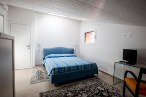 Postel nebo postele na pokoji v ubytování B&B - Uva Residence