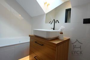 Łazienka w obiekcie Lyck Apartamenty