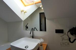 Łazienka w obiekcie Lyck Apartamenty