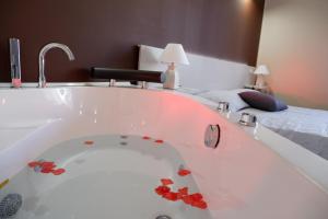 Koupelna v ubytování B&B Leus Appartment + 37 fotografií