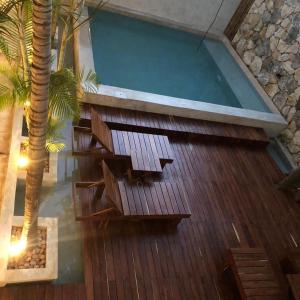 Bazén v ubytování Hotel Casa Bamboo nebo v jeho okolí