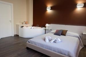Postel nebo postele na pokoji v ubytování B&B Leus Appartment