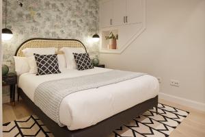Posteľ alebo postele v izbe v ubytovaní Hygge by FeelFree Rentals