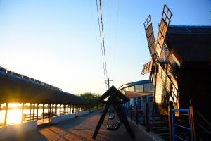 a view of a train station with a camera at Hotel Sunrise in Crisan