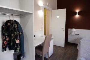 Postel nebo postele na pokoji v ubytování B&B Leus Appartment