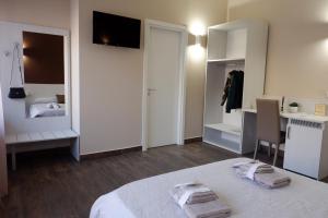 Postel nebo postele na pokoji v ubytování B&B Leus Appartment