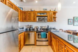 Kuchyň nebo kuchyňský kout v ubytování La Paloma Blanca D2 + 24 fotografií