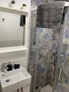 Kúpeľňa v ubytovaní Sol Ohana Apartamento Boutique