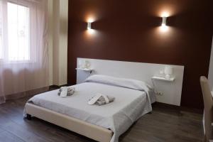 Postel nebo postele na pokoji v ubytování B&B Leus Appartment