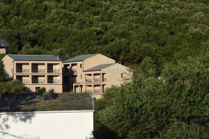 an aerial view of a hotel in the mountains at Hôtel Casa Mea in Bastia