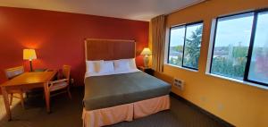 Katil atau katil-katil dalam bilik di Olympic View Inn