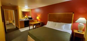 Katil atau katil-katil dalam bilik di Olympic View Inn