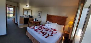 Katil atau katil-katil dalam bilik di Olympic View Inn