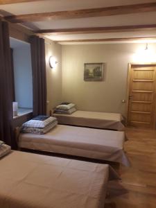 Postel nebo postele na pokoji v ubytování PATMALAS