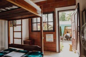 Postel nebo postele na pokoji v ubytování Esperanto Bed & Breakfast Surf Hostel