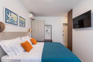 Postel nebo postele na pokoji v ubytování Promenade Room Split ****