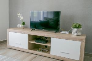 TV a/nebo společenská místnost v ubytování Kardos Villa