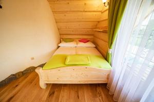 Postel nebo postele na pokoji v ubytování Domki u Bobaków