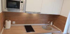 Η κουζίνα ή μικρή κουζίνα στο City apartment Anykščiai +15 φωτογραφίες