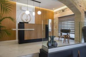 TV a/nebo společenská místnost v ubytování Casa D'Irene Deluxe Hotel