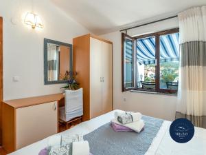 Postel nebo postele na pokoji v ubytování Villa Ivan
